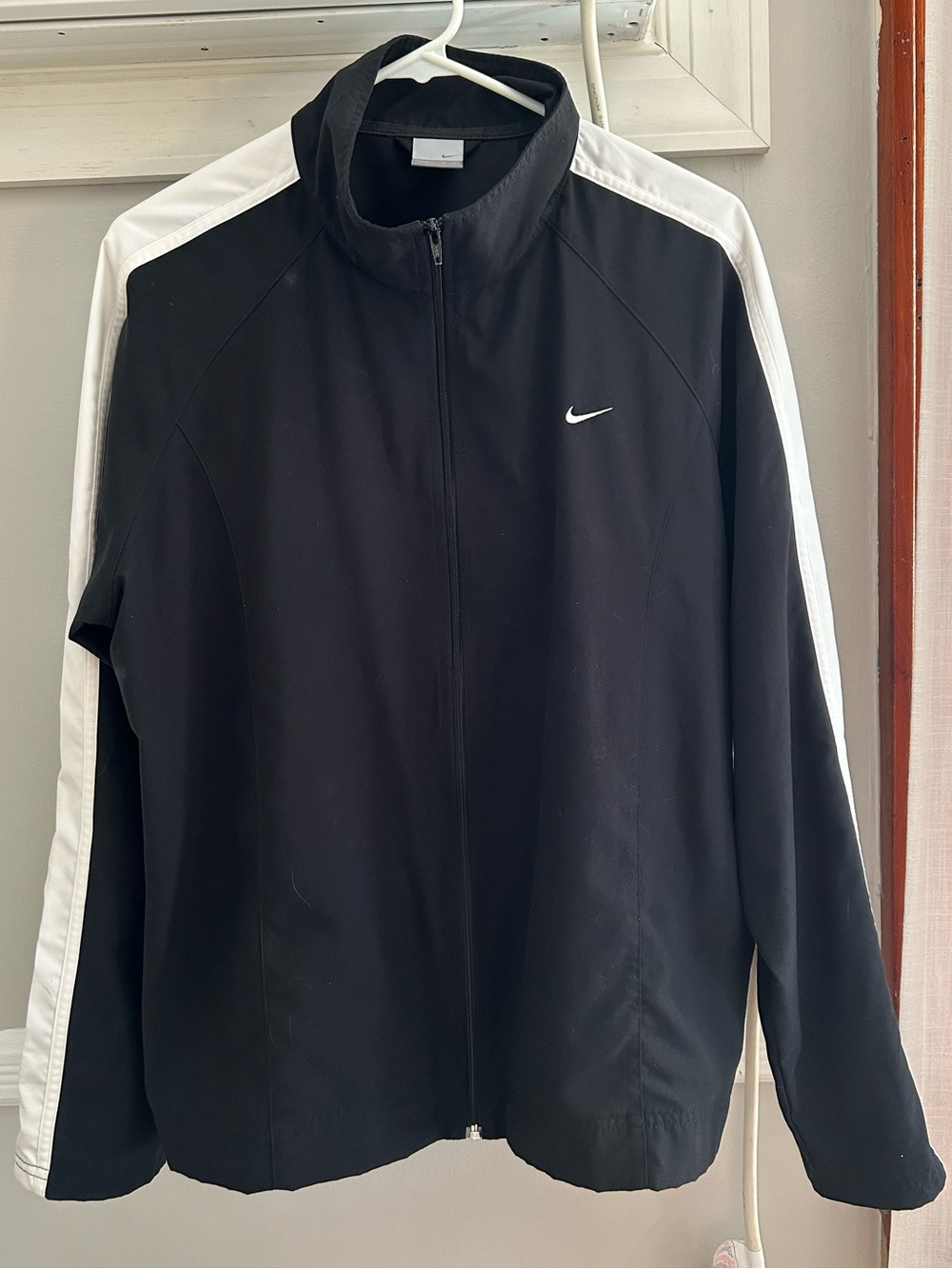Nike Black Track Jacket with White Shoulder Stripes